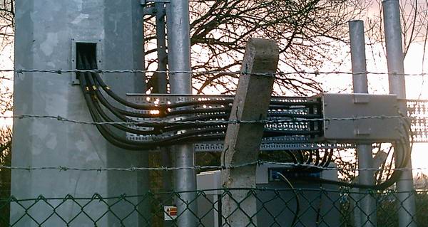 6 chunky cables to give, on average, 1,500 people a cell phone signal (yeah, right!).  This one next to a hospital in the midddle of Bridgend town.